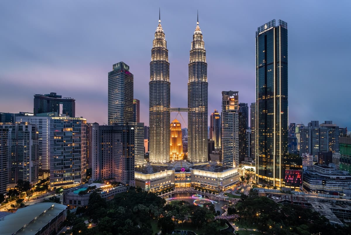 Kuala Lumpur skyline at night with Petronas Towers